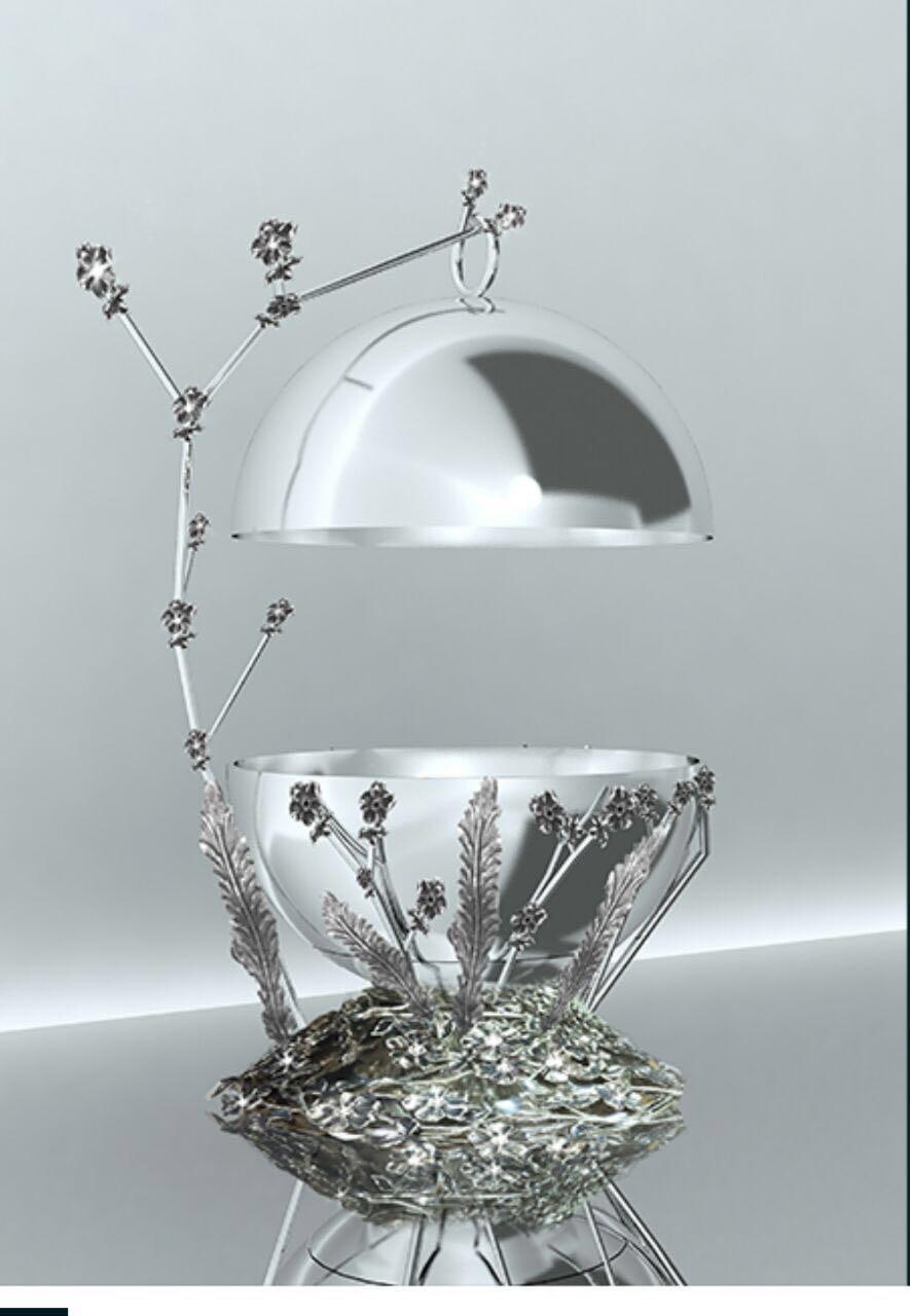 Silver domed bowl on a sculpted silver base with a tall branch-shaped finial