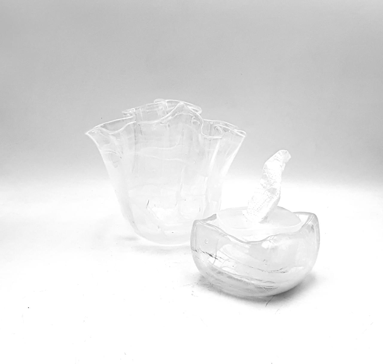 Clear frosted glass vase with a wavy rim and a matching glass bowl